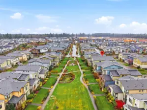 Stunning aerial perspective of walking trails, open space, and community design in Ten Trails Black Diamond WA.