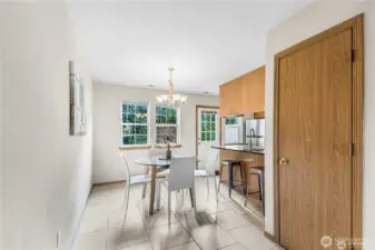 Dining room and kitchen have back door that leads to private patio for relaxing with your morning coffee or BBQing on those Summer nights