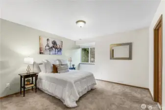 Primary bedroom that is very spacious and has walk in closet.