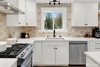 Fully remodeled kitchen featuring modern finishes and updated disign!