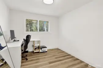 Bedroom #4 Comfortable space with natural light, ideal for guests, home office or hobby room!