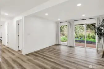 Lower level living area opens to backyard, perfect for indoor-outdoor enjoyment or multi generation living!