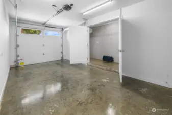 Polished concrete in the well appointed secure garage with automatic opener. Additional auxilary storage space in there for Kayaks, paddle boards, camping gear, you name it!