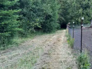 behind pasture, mowed