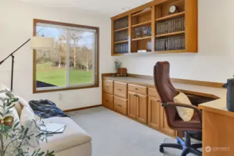 Upper level office with functional built-in cabinets