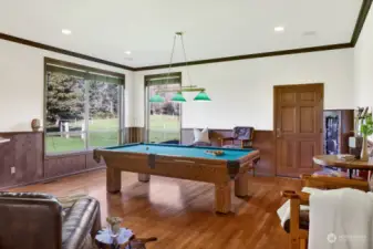 Games room with access to the deck and hot tub