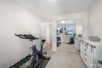 Mirrored closet doors equal added feeling a space to this room