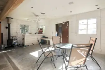 Garage interior with woodstove.