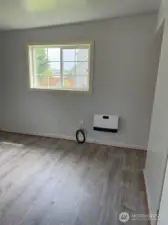 Smaller bedroom fits a full or twin