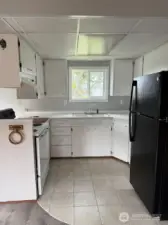 Kitchen with fridge