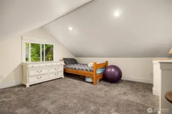 one of two rooms on top of garage