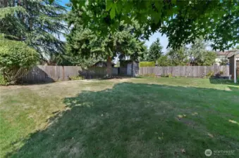 Moree of the backyard.  There are lots of planting spots in this yard.