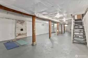 Large basement with high 8' ceilings, and exterior door access.  Blank canvas to reimagine the space...ADU, guest suite, hobby room or home gym?