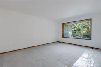 Living room looks out to gorgeous front yard