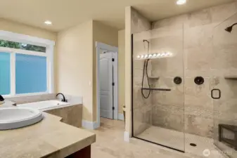 The primary bath with soaking tub, double sinks. Double headed shower.