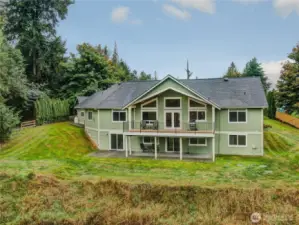 This shows the back of the home with the deck