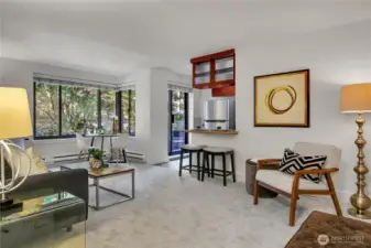 Welcome to unit 205 at the iconic Decatur Condominium. This prized unit is one of two in the building with its own private outdoor patio! This particular home also comes with parking and storage; a unique combo.
