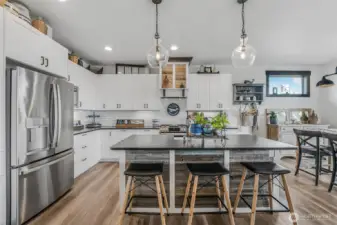 Stainless steel appliances and granite countertops.