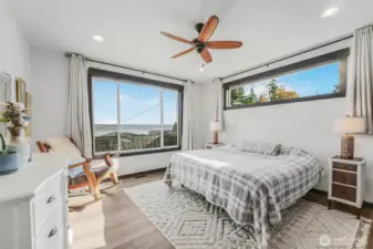 Wake up to the view from the main floor primary bedroom.