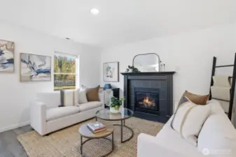 Second living area with gas fireplace.