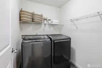 Laundry room on upper level.