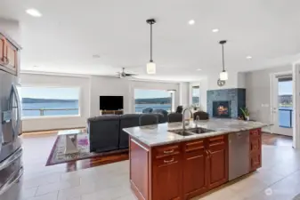 Can you imagine cooking dinner while enjoying guests surrounding the immense island?? And cleaning up won't feel like a chore with that view to enjoy.