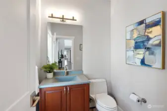 This half-bath is located on the main floor. Adjacent to an exterior access door makes this perfect when you are out working in the yard. No need to trek through the entire house to take care of business.