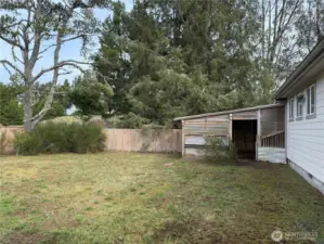 Livestock pen attached to enclosed back porch