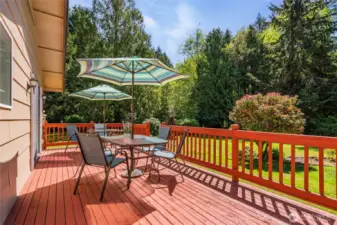 Relax on this nice deck and look out over your 2.25 acres of nicely manicured landscaping