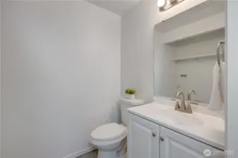 Remodeled powder room/utility room on main floor