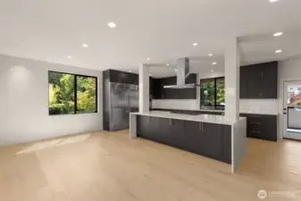 Chefs kitchen boasts Bosche SS appliances, Electrolux double fridge, wine bar walk in pantry