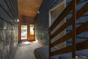 The enclosed entry is a statement and also gives access to the office above the shop.