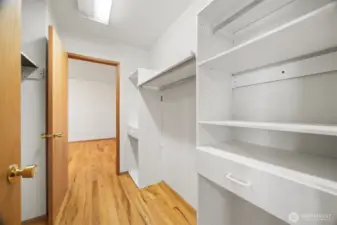 There is a shared walk-through closet between the two bedrooms on the main floor.