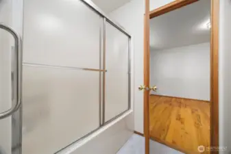 The full bath with the tub and toilet, as each bedroom on the main floor has their vanity in each bedroom.