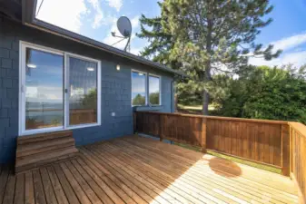 The attached garage is oversized and has plenty of room for storage, a workbench and two full-sized vehicles.
