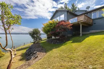 The covered front deck is ideal for grilling and barbequing even in inclimate weather.