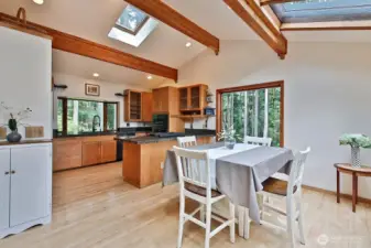 Vaulted ceilings, sky lights and windows galore!