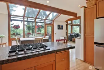 Spacious open floor plan with an atrium dining area that leads to an expansive deck. Ideal home for entertaining and equally ideal for retreating.