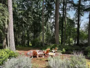Now let's explore what lives outside your home....like this fire circle, a perfect place to gather and enjoy the luxury of having your own slice of paradise on Whidbey Island.