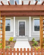 Arbor with gate into front yard