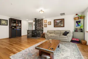 So much flexible space with gorgeous hickory floors!