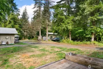 The huge backyard, complete with wired detached garage, and shed could have so many uses.