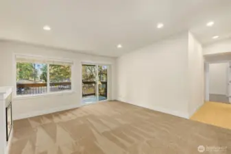 Slider doors off living room open to private balcony