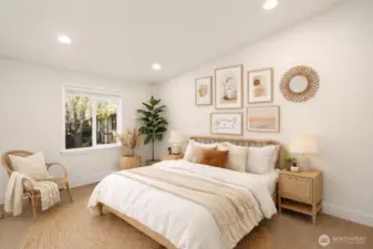 Spacious Primary Bedroom with vaulted ceilings (virtually staged)