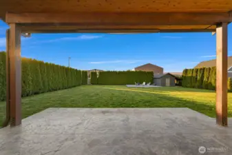 Beautiful large + covered stamped concrete back patio