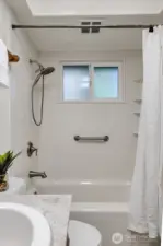 Soak away the day in the full bath's generously sized bathtub.