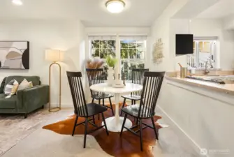 Dining space with S-facing large windows bringing in natural light