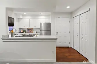 Entry closet to the left of the front door when you walk in.
