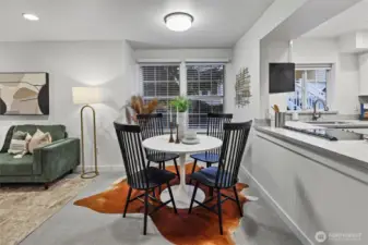 Dining space with S-facing large windows bringing in natural light