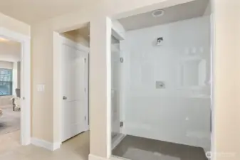 Primary shower and walk-in closet